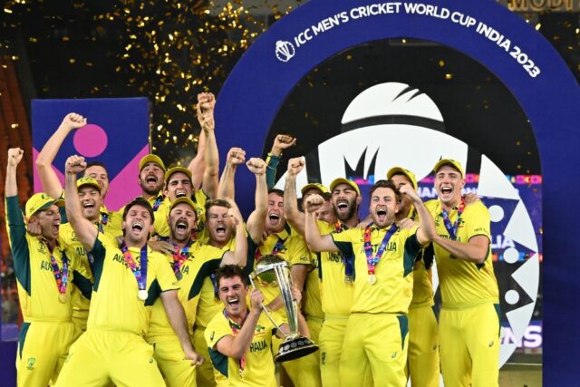 Champions: Australia's players celebrate with the trophy