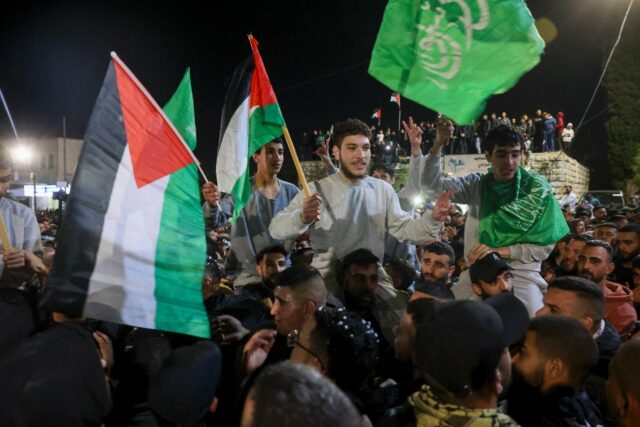Crowds across the West Bank cheered and waved flags