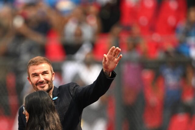 David Beckham waves to fans before the Cricket World Cup semi-final between India and New
