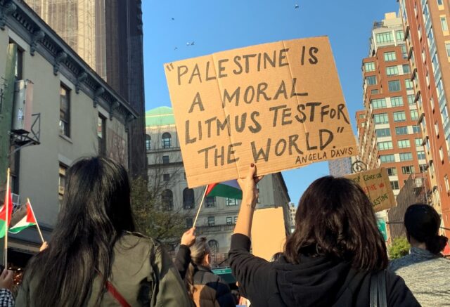 Demonstrators march during the "Palestine to Africa - Palestinian Liberation is Black Libe