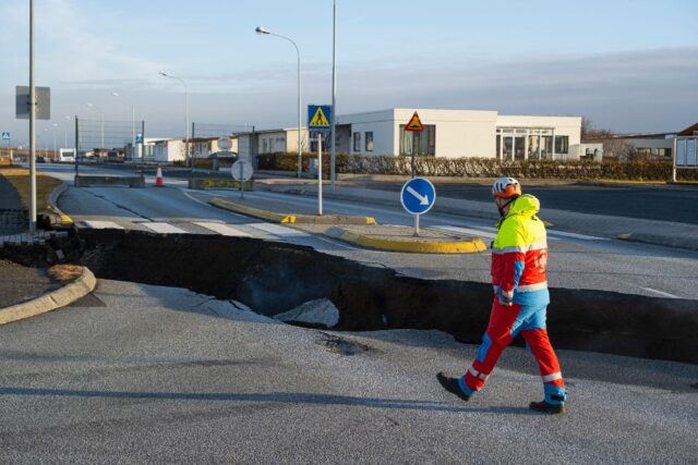 A gaping crevice in a main road of Grindavik, southwestern Iceland, caused by a series of