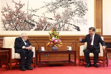 Henry Kissinger (L) last visited China as recently as July this year, when he held talks with President Xi Jinping (R)
