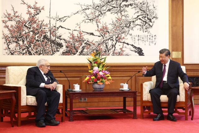 Henry Kissinger (L) last visited China as recently as July this year, when he held talks w