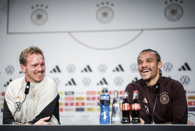 Leroy Sane (R) and coach Julian Nagelsmann at a press conference ahead of Germany's match