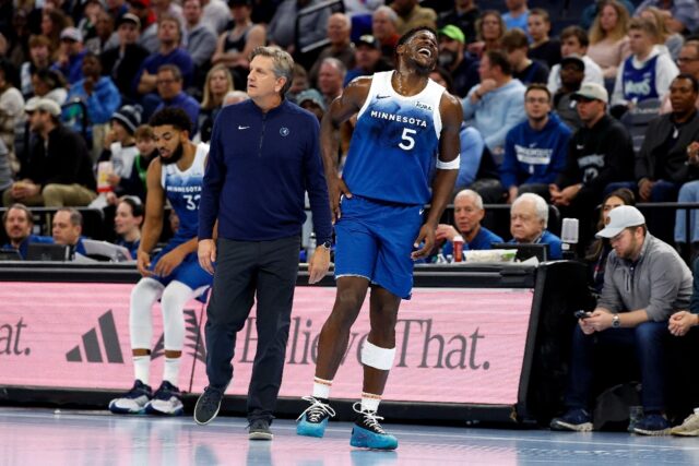 Minnesota's Anthony Edwards reacts to a hip bruise in the third quarter of an NBA victory