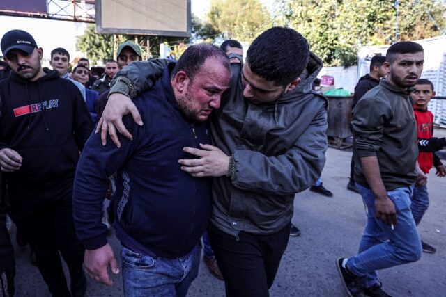 Mourners at the funeral of a 14-year-old Palestinian killed during clashes with Israeli fo