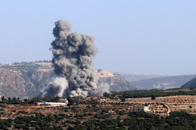Smoke billows from the site of an Israeli strike in Lebanon's southern village of Jibbayn