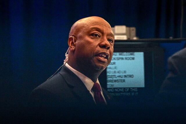 US Senator Tim Scott speaks to members of the media following the third Republican preside