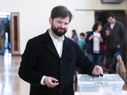 Chile's President Gabriel Boric votes on the draft of a new constitution in Punta Are