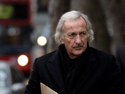 LONDON, ENGLAND - DECEMBER 16: Journalist John Pilger, who has provided bail money for Wik