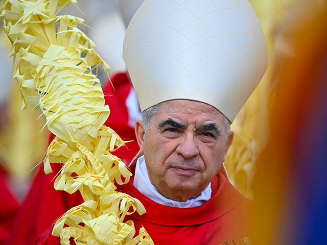 Italian Cardinal Giovanni Angelo Becciu takes par in the procession of the Palm Sunday mas