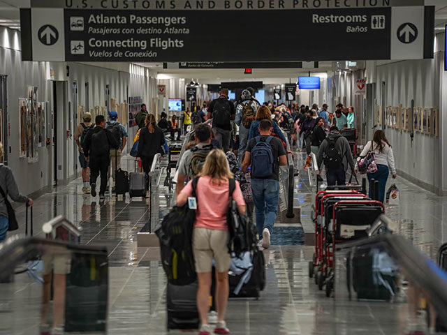 Passengers head to US Customs at Hartsfield-Jackson Atlanta International Airport (ATL) in