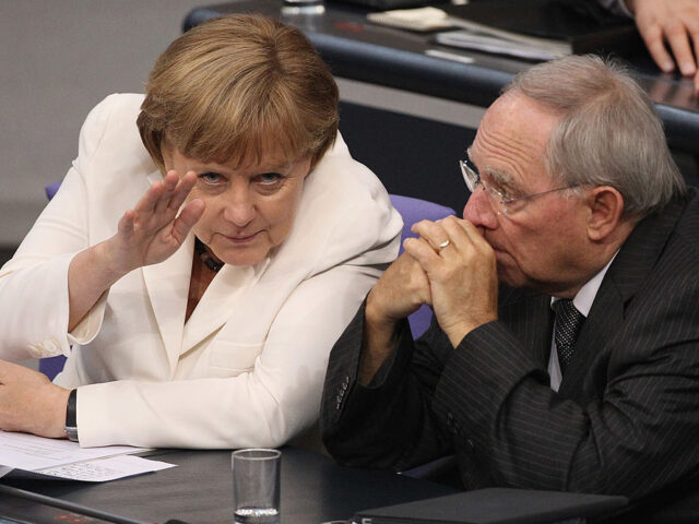 BERLIN, GERMANY - JUNE 29: German Chancellor Angela Merkel chats with Finance Minister Wo