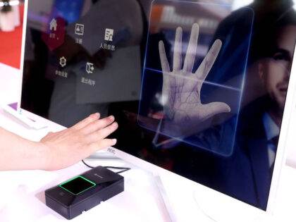 BEIJING, CHINA - JUNE 07: A exhibitor demonstrates Palm Recognition Access Control System