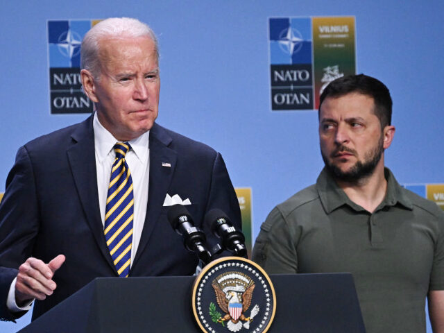 US President Joe Biden speaks alongside Ukrainian President Volodymyr Zelensky during a G7
