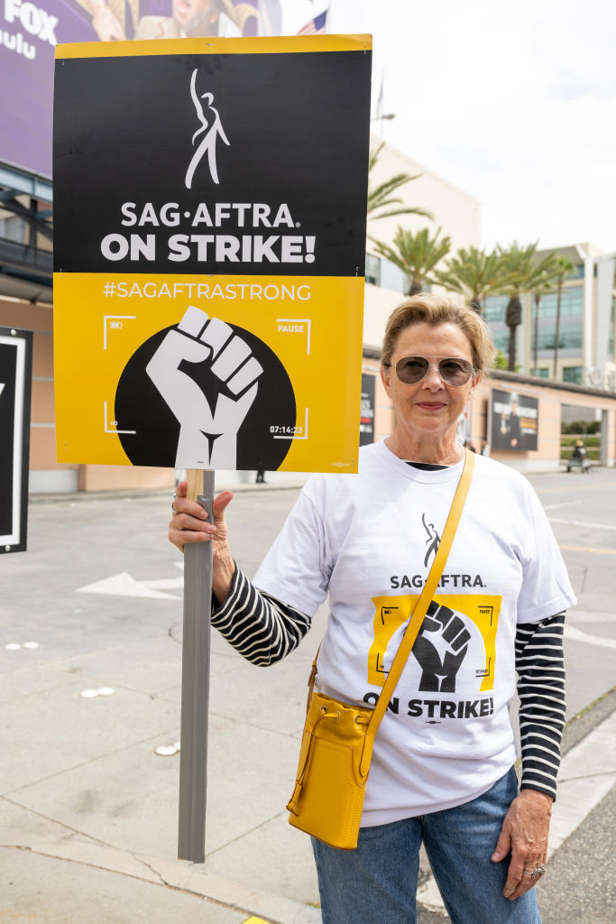 Actress Annette Bening joins members and supporters of SAG-AFTRA and WGA on the picket line at Fox Studios on August 08, 2023 in Los Angeles, California. Members of SAG-AFTRA and WGA (Writers Guild of America) have both walked out in their first joint strike against the studios since 1960. The strike has shut down a majority of Hollywood productions with writers in the third month of their strike against the Hollywood studios. (Photo by Amanda Edwards/Getty Images)