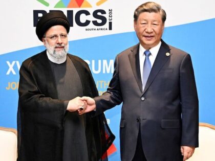 Chinese President Xi Jinping meets with Iranian President Ebrahim Raisi on the sidelines o