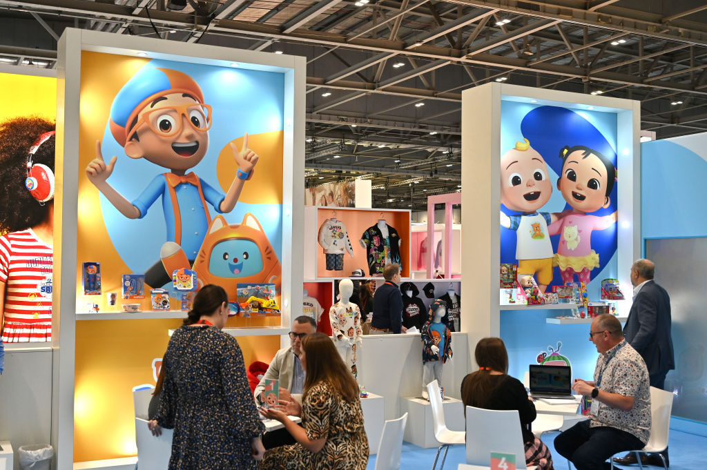 Posters showing Blippi and CoComelon characters is displayed at the Moonbug Entertainment stand on October 4, 2023, in London, England. Social media users have called for a boycott of Netflix for a scene in an episode of its show CoComelon Lane depicting a boy dancing in a tutu that critics called "just evil."