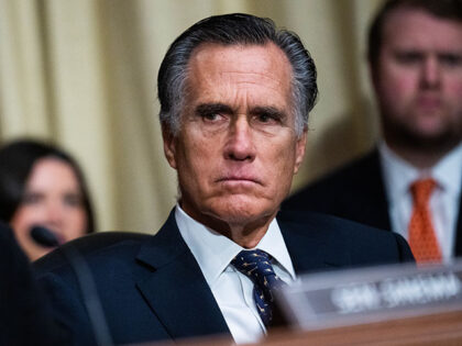 Sens. Mitt Romney, R-Utah, and Kyrsten Sinema, I-Ariz., attend the Senate Homeland Securit