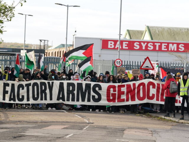 Trade unionists and protesters form a blockade outside weapons manufacturer BAE Systems in