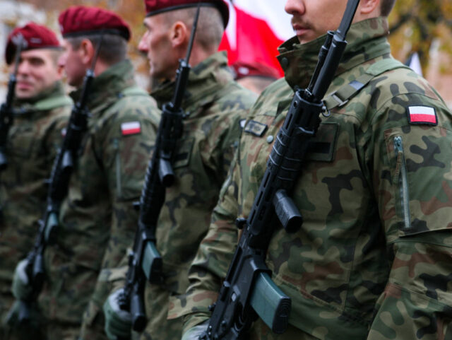 KRAKOW, POLAND - NOVEMBER 11: Patriotic procession walking through the city streets during