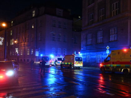 Ambulances and police cars are seen near the Charles University in central Prague, on Dece