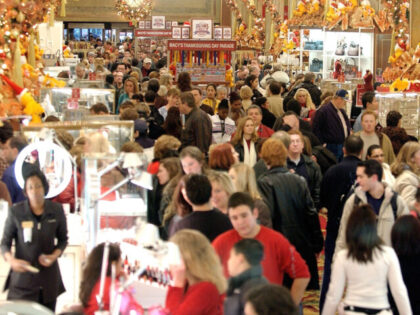 NEW YORK - NOVEMBER 28: Shoppers clog the aisles at Macy's Department store November