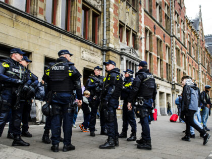 Dutch officers carry out extra patrols at the Central Station in Amsterdam, The Netherland