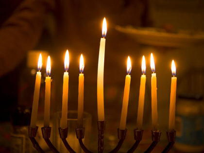 A Menorah at a family celebration on the last night of the Hannukah Jewish fesitval. The m