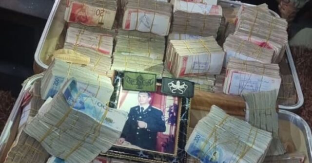 PHOTO: Over $1 Million Cash in Suitcases in Hamas Official's Home in Gaza