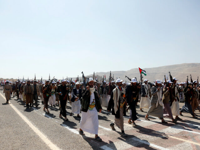 Amran, YEMEN - DECEMBER 20: Yemen's Houthi loyalists take part in an armed parade for more