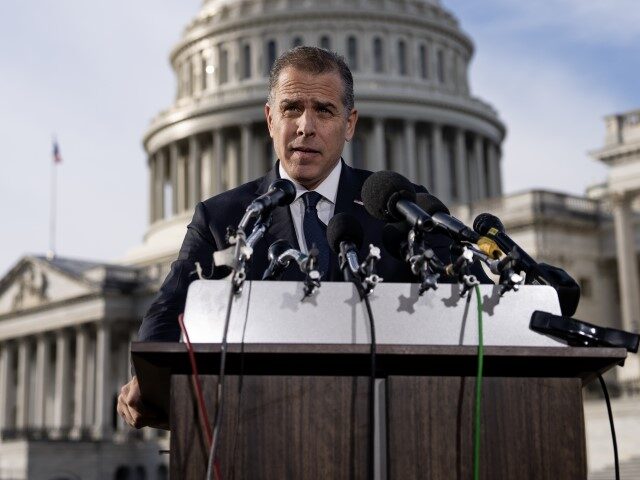 President Joe Biden's son Hunter Biden talks to reporters outside the U.S. Capitol on December 13, 2023 in Washington, DC. Hunter Biden defied a subpoena from Congress to testify behind closed doors ahead of a House vote on an impeachment inquiry against his father. (Drew Angerer/Getty Images)