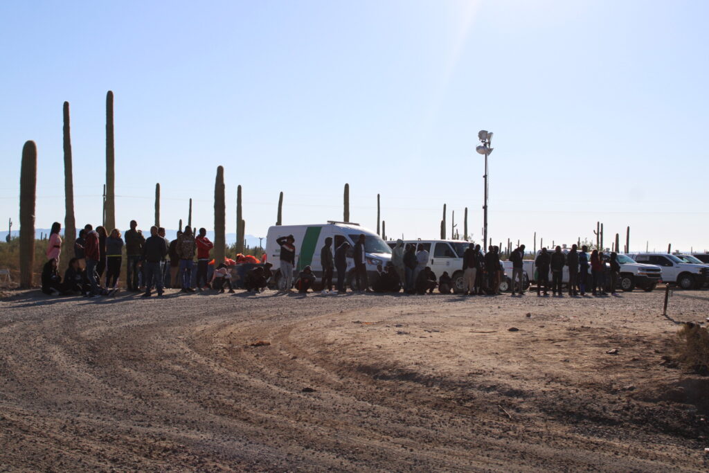 Migrants moved to rally point to await transportation. (Randy Clark/Breitbart Texas)