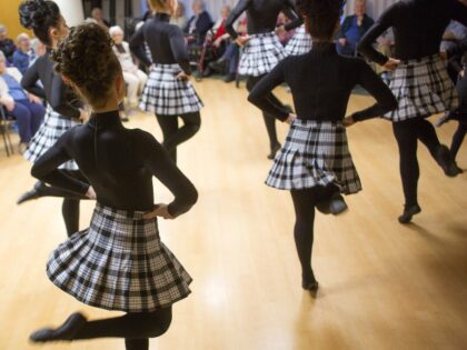 Students from the Stillson School of Irish Dance perform at Seventy Five State Street, an