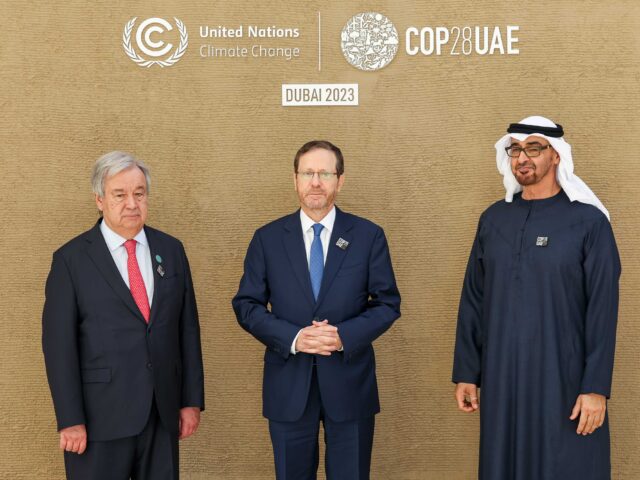 DUBAI, UNITED ARAB EMIRATES - DECEMBER 1: In this handout image supplied by COP28, (L-R) A