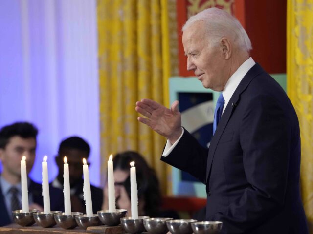 WASHINGTON, DC - DECEMBER 11: President Joe Biden speaks at a Hanukkah reception in the Ea