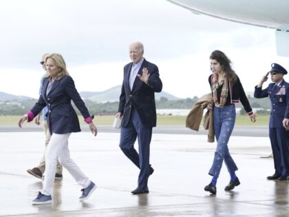 President Joe Biden, first lady Jill Biden, and their granddaughter Natalie Biden walk off