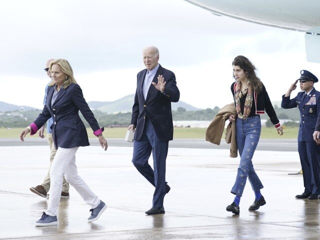 President Joe Biden, first lady Jill Biden, and their granddaughter Natalie Biden walk off Air Force One upon arrival at Henry E. Rohlsen Airport in St. Croix, U.S. Virgin Islands, Wednesday, Dec. 27, 2023. Biden is spending the New Year in St. Croix with family. (Stephanie Scarbrough/AP)