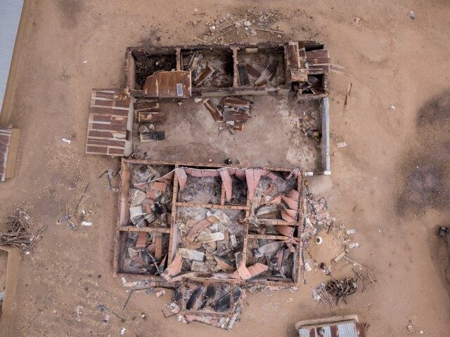 An aerial view shows destroyed and burned houses after a recent Fulani attack in the Adara farmers' village of Angwan Aku, Kaduna State, Nigeria on April 14, 2019. The ongoing strife between Muslim herders and Christian farmers, which claimed nearly 2,000 lives in 2018 and displaced hundreds of thousands of …