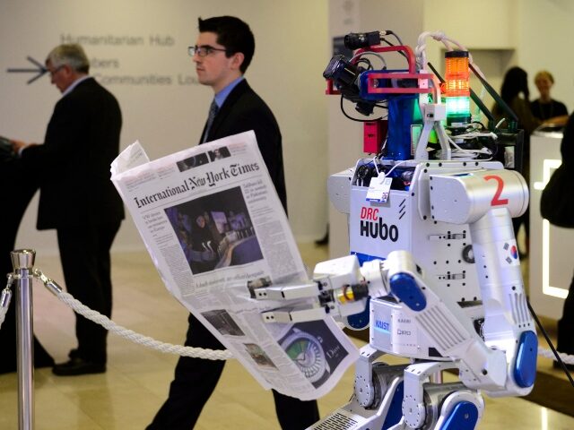 Robot reading a newspaper