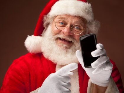 Santa Claus holding a smartphone