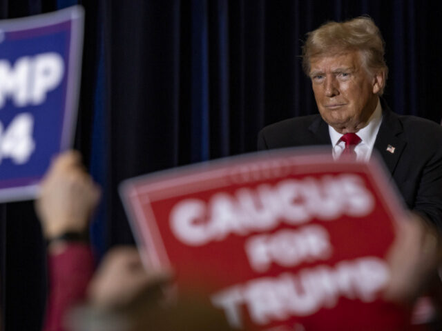 Former US President Donald Trump during a campaign rally in Coralville, Iowa, US, on Wednesday, Dec. 13, 2023. A federal judge in Washington granted Donald Trump's request to pause the 2020 election obstruction case scheduled for trial March 4 while he presses a claim for sweeping immunity against criminal charges. …
