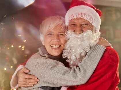 Woman hugging Santa
