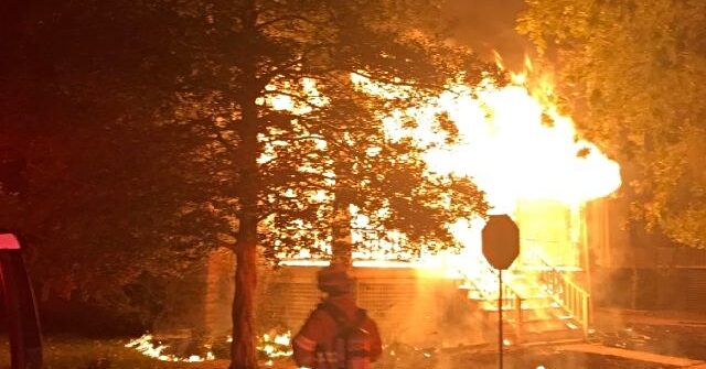 WATCH: House Explodes When Suspect Fires Gun at Police