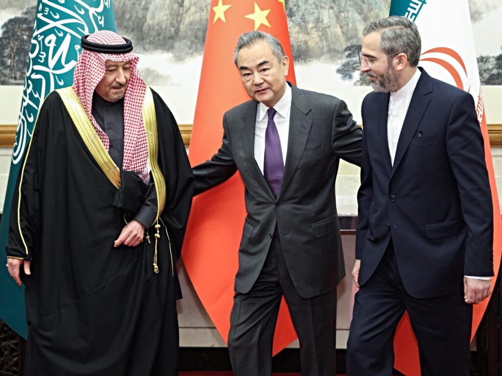 Wang Yi, a member of the Political Bureau of the Communist Party of China CPC Central Committee and director of the Office of the Foreign Affairs Commission of the CPC Central Committee, meets with Saudi Deputy Foreign Minister Waleed Elkhereiji and Iranian Deputy Foreign Minister for Political Affairs Ali Bagheri Kani, in Beijing, capital of China, Dec. 15, 2023. (Photo by Liu Bin/Xinhua via Getty Images)