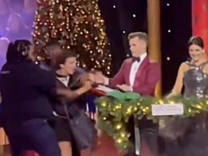 Carols by Candlelight co-hosts David Campbell and Sarah Abo were interrupted by pro-Palest