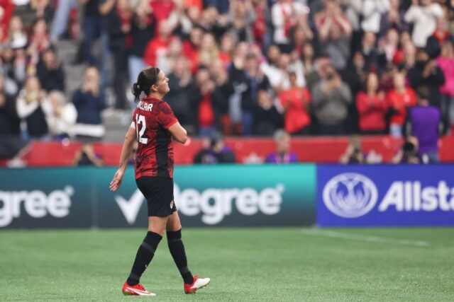 Canada's Christine Sinclair leaves the field for the final time as he bids farewell to int