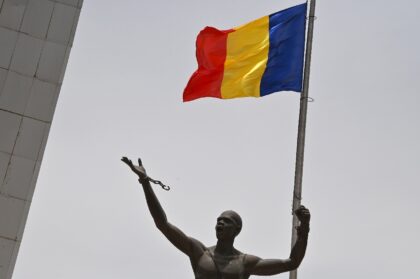 In Chad's capital N'Djamena, the national flag flies on April 23, 2021, marking the state