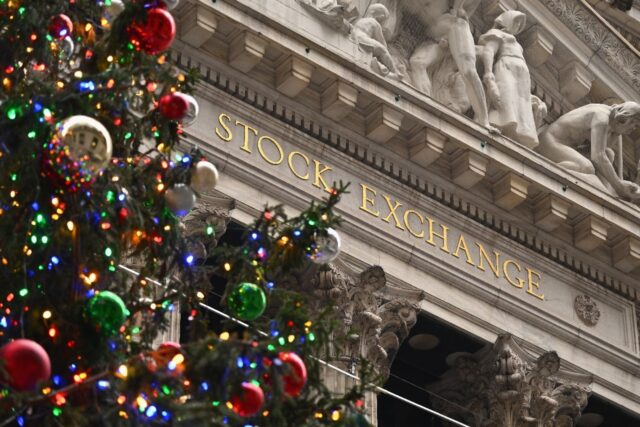 Holiday gains on the New York Stock Exchange helped drive an uptick in Asian stocks Wednes