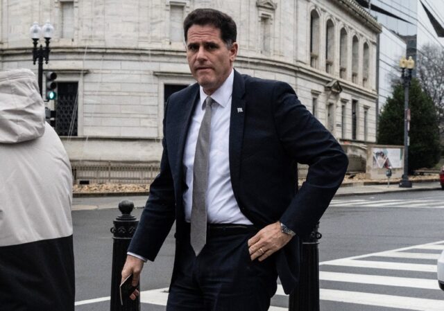 Israel's Minister for Strategic Affairs Ron Dermer walks into the Executive Office Buildin